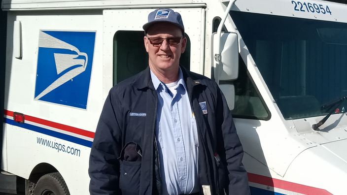 Erik Eicholtz, a driving safety instructor, stands near an LLV at the Paducah, KY, Post Office.