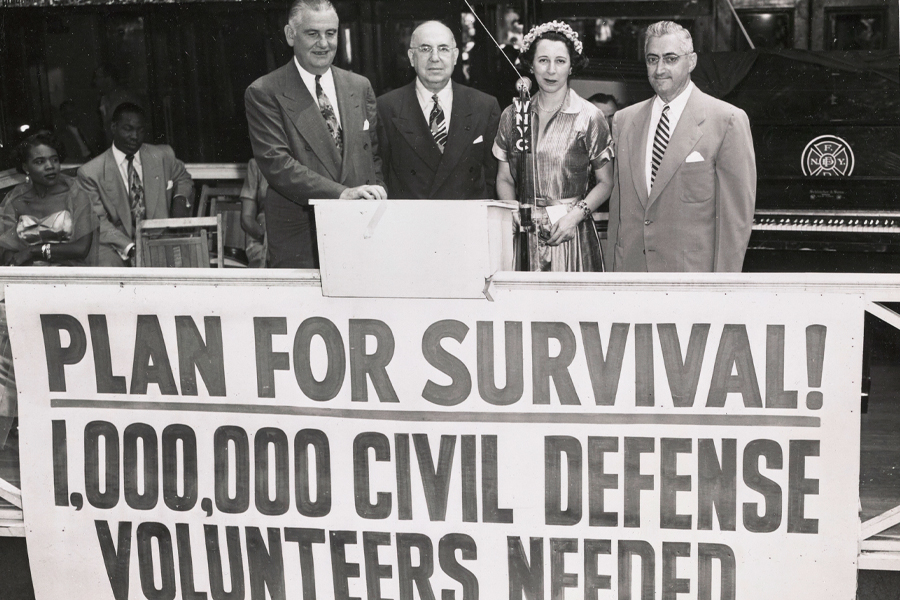 New York City Postmaster Albert Goldman, second from left, pictured along with other participants at a civil defense volunteer drive in the 1950s.