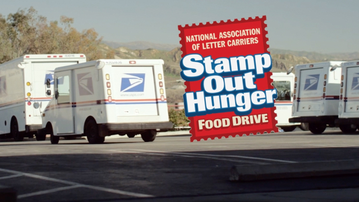 A "Stamp Out Hunger" logo overlayed on a photo of several USPS delivery vehichles