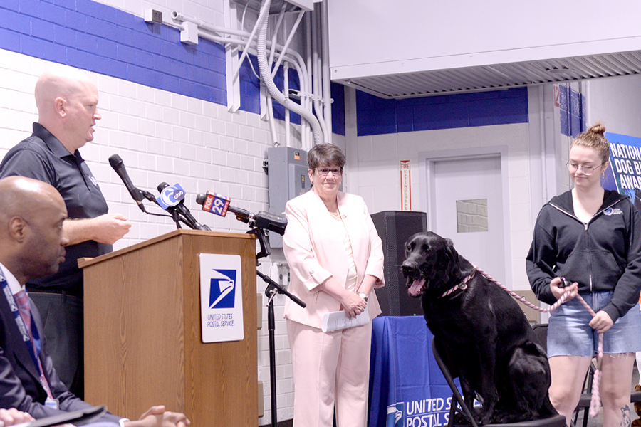 Participants gather at the May 30 news conference to preview the USPS National Dog Bite Awareness Campaign. Do you know where the event was held?