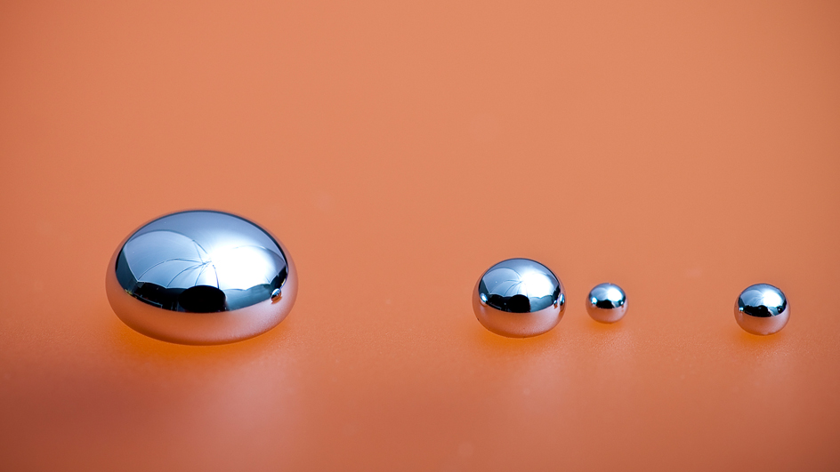 Small droplets of a metallic substance on a clean surface