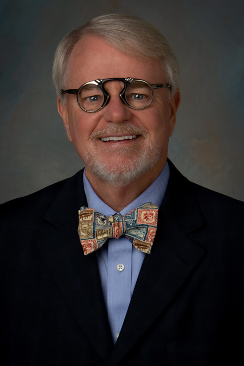 Portrait of smiling man in business suit