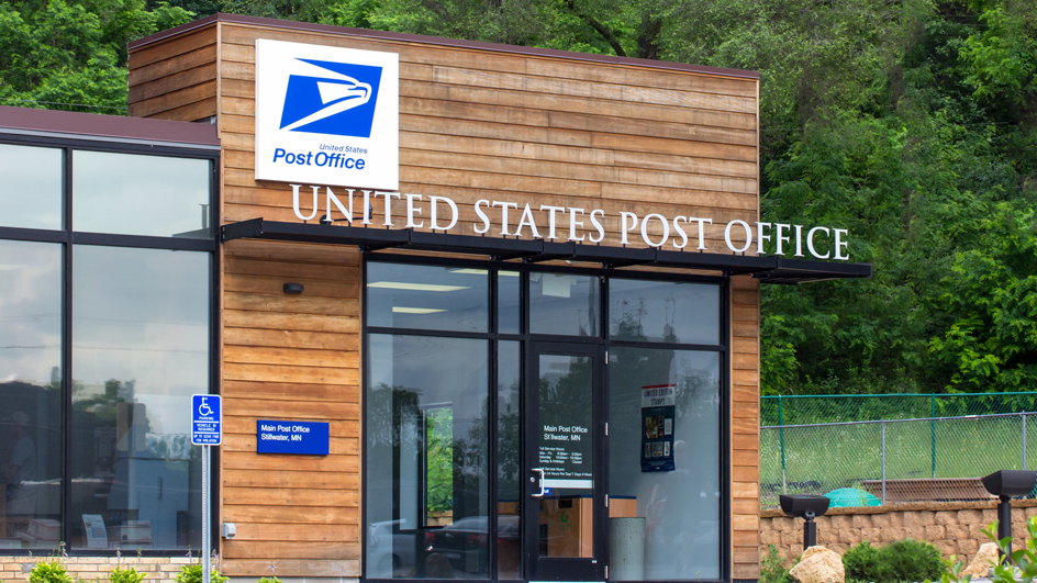 The outdoor entrance to a U.S. Post Office