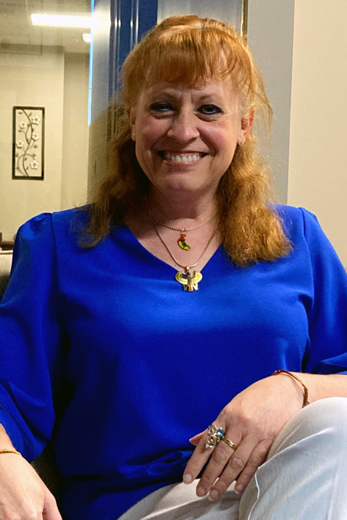 Susan Wozniak, administrator for the USPS Employee Assistance Program, in her office in Aurora, CO.