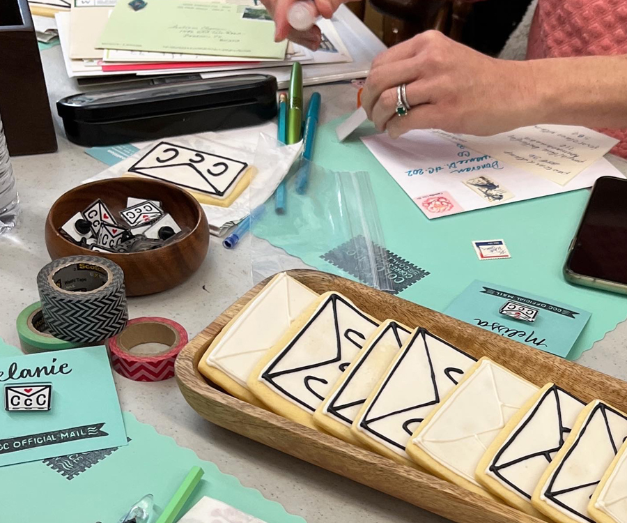 A stamped letter getting decorated