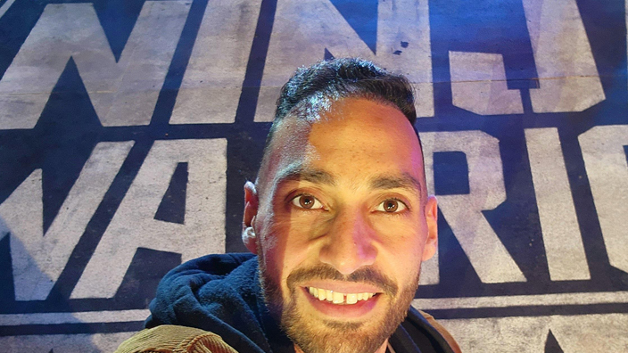 Ahmed Amin, an Orlando, FL, distribution operations supervisor, on the set of NBC’s “American Ninja Warrior.”