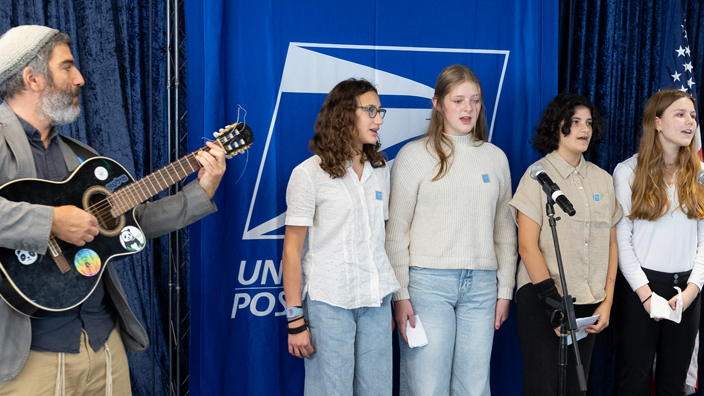 The student choir at Milton Gottesman Jewish Day School in Washington, DC, performs at the Postal Service’s Hanukkah stamp dedication ceremony on Sept. 19.