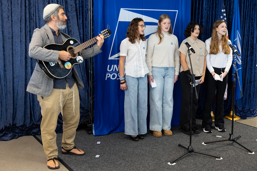 The student choir at Milton Gottesman Jewish Day School in Washington, DC, performs at the Postal Service’s Hanukkah stamp dedication ceremony on Sept. 19.