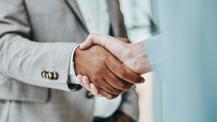 Two people shaking hands