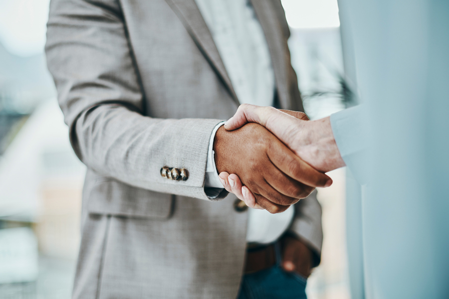 Two people shaking hands