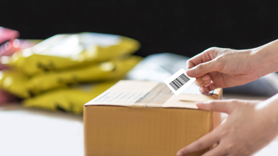 A customer prepares to mail a package