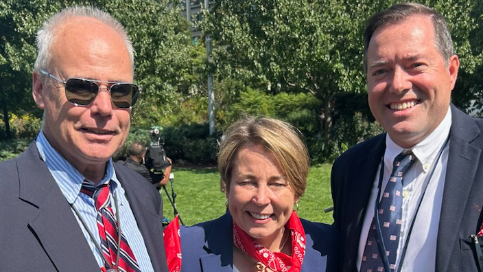 Participants in a National Day of Service and Remembrance care package event included, from left, Paul Bolas, a USPS senior territory sales executive; Massachusetts Gov. Maura Healey; and Brian Cronin, a Boston customer services manager.