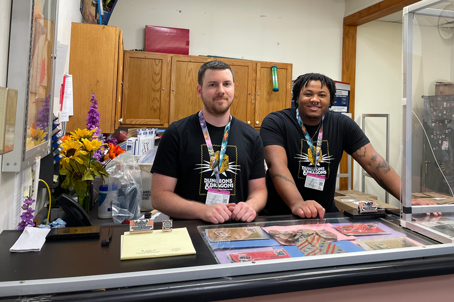 Xavier Davis, right, and Troy Moore, Kansas City, MO, stamp fulfillment services clerks, work at the USPS booth at Gen Con, the gaming conference where the Dungeons & Dragons stamps were dedicated in August.