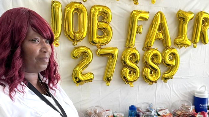 Postmaster Patricia Green attends the job fair at the Washington, NC, Post Office.