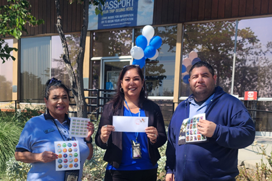 USPS employees gather outside the Sierra Madre, CA, Post Office during the “date meets ZIP” festivities. From left are Elizabeth Ascencio, retail associate; Anna Rodriguez, postmaster; and Christopher Estrada, retail associate.