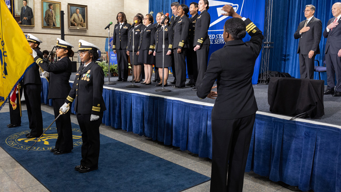 A musical ensemble performs as the colors are presented at the recent Thank You, Healthcare Community stamp dedication ceremony. Do you know who spoke at the event?