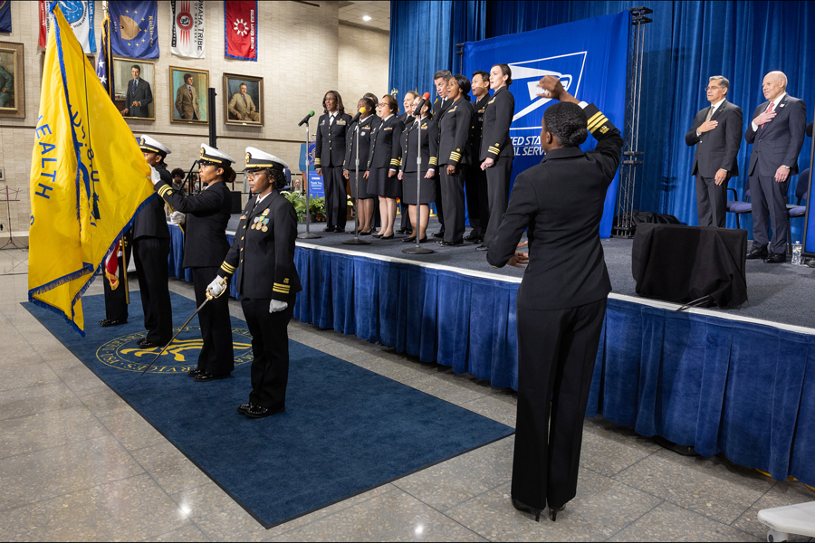 A musical ensemble performs as the colors are presented at the recent Thank You, Healthcare Community stamp dedication ceremony. Do you know who spoke at the event?