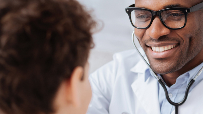 A doctor examining a patient