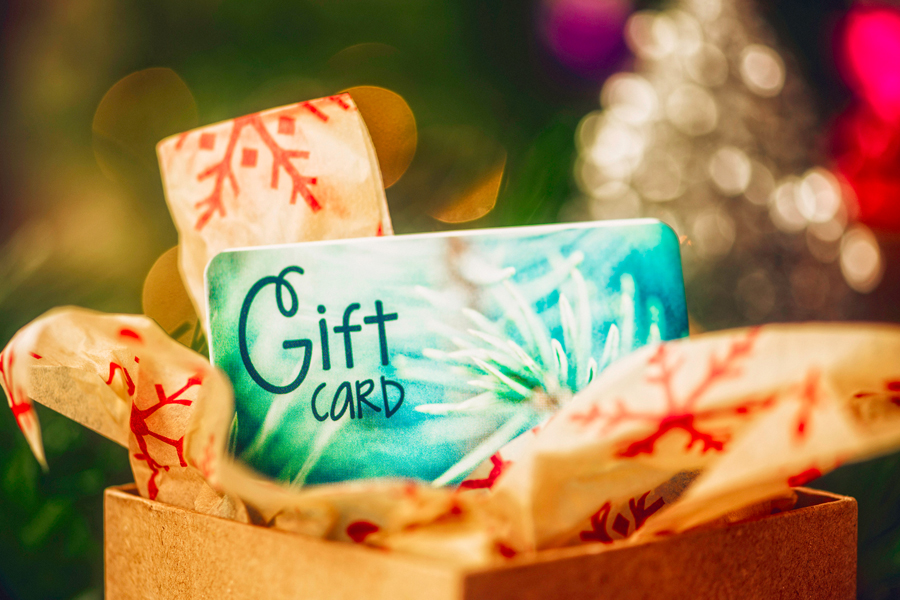 A close up of a holiday gift card