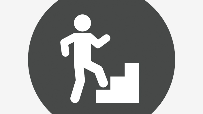 A black-and-white illustration of a person walking up stairs, symbolizing the climb up a career ladder