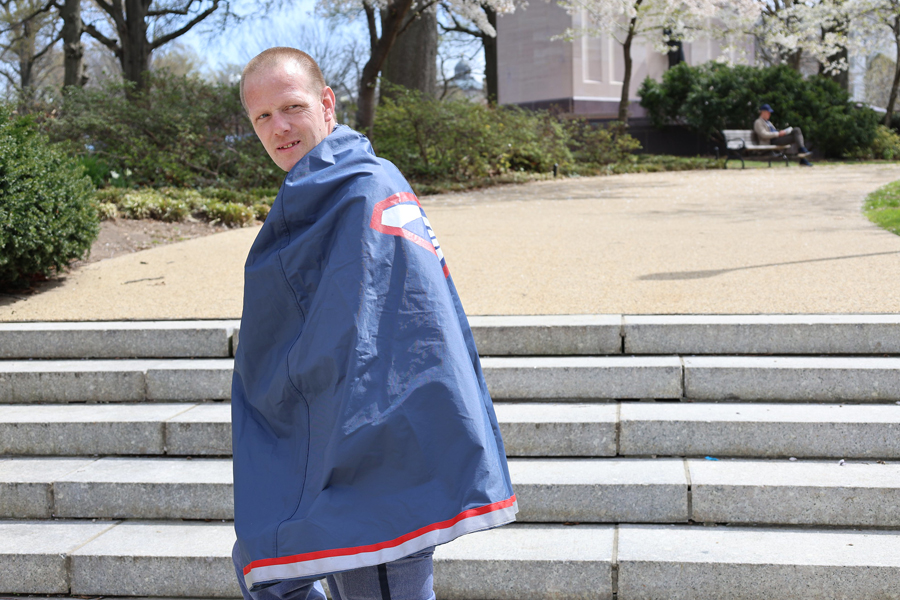 Hamburg, NY, Letter Carrier Timothy Martin dons a postal cape. Do you know why the National Association of Letter Carriers honored him this year?