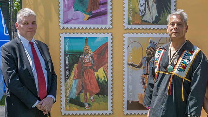 The four Powwows: Celebrating Native American Culture stamps showing dancers wearing traditional garb.