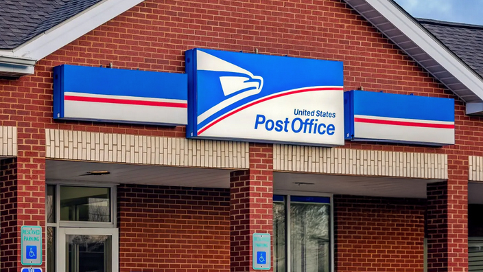 A Post Office with a red brick façade.
