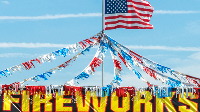 A colorful roadside fireworks stand