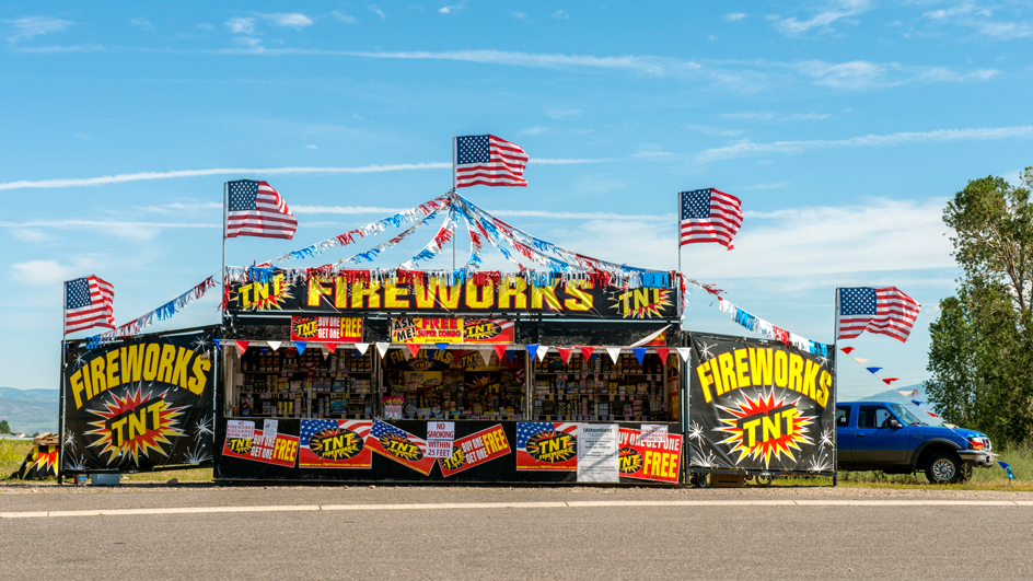A colorful roadside fireworks stand