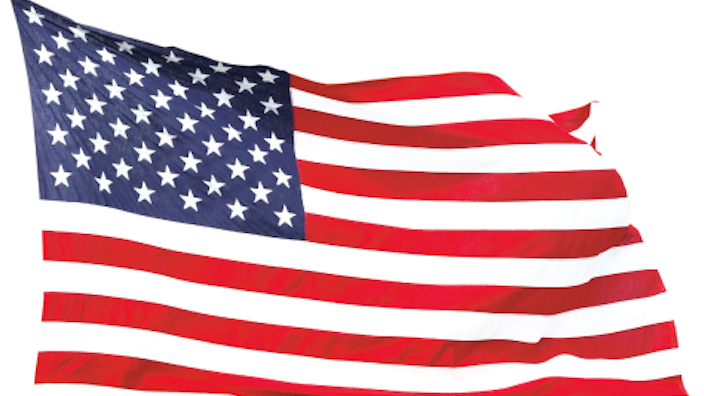 The U.S. flag appears on a white background in a new USPS stamp.