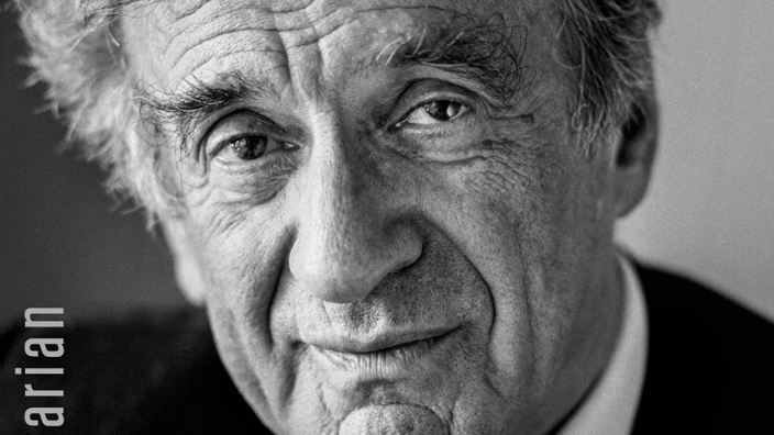 A stamp bearing a black-and-white image of humanitarian Elie Wiesel