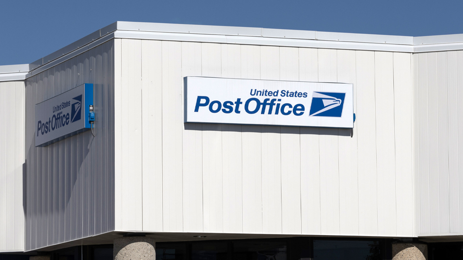 The outside of a large suburban Post Office