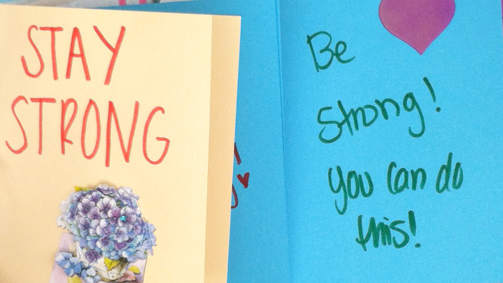 An array of colorful greeting cards and envelopes