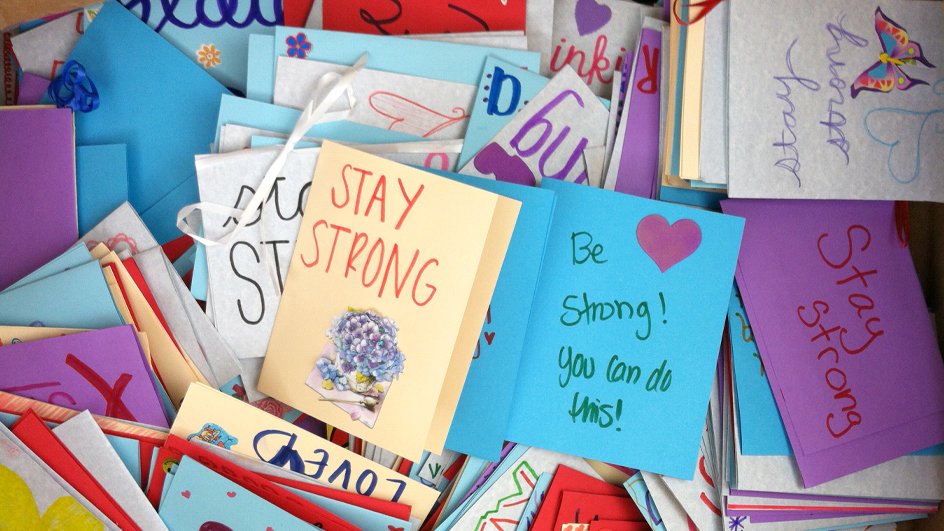An array of colorful greeting cards and envelopes