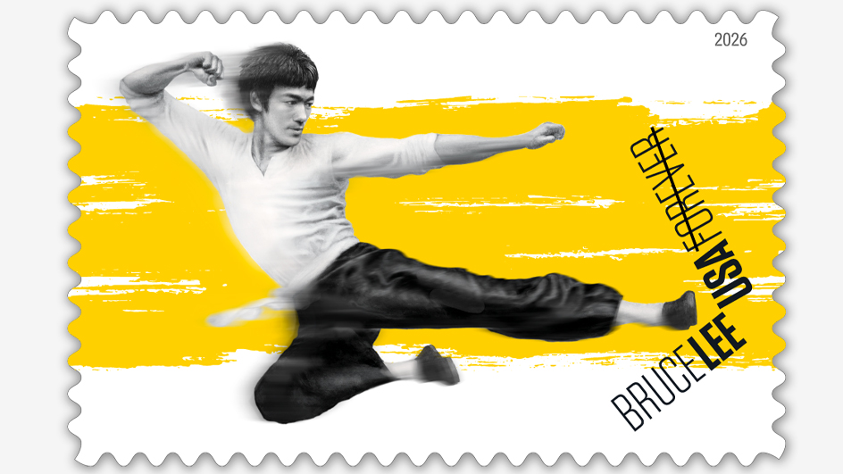 A stamp showing Bruce Lee performing a high-flying kick