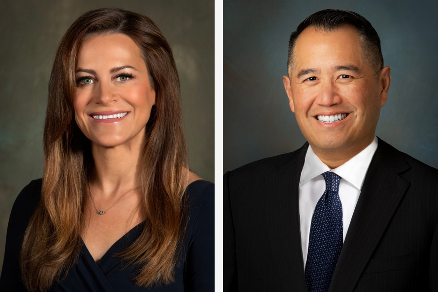 Side by side studio portraits of a smiling woman and man