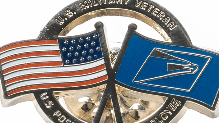 A lapel pin on a white background