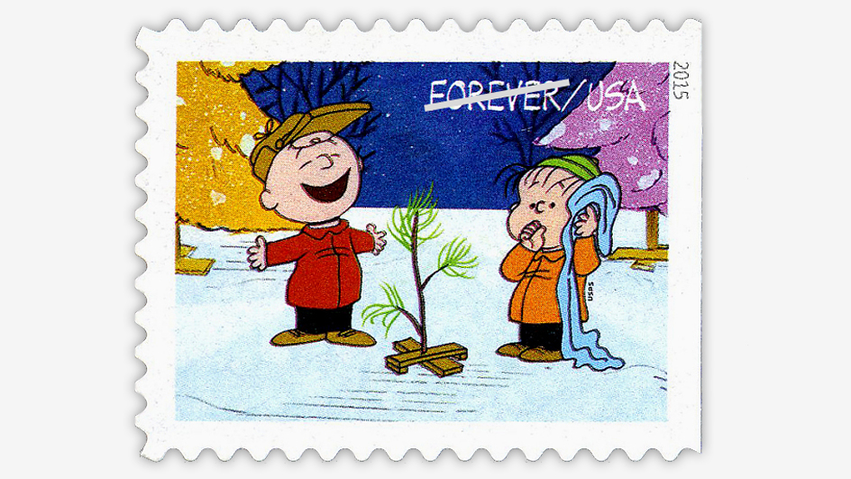 A stamp depicting Charlie Brown and Linus among Christmas trees