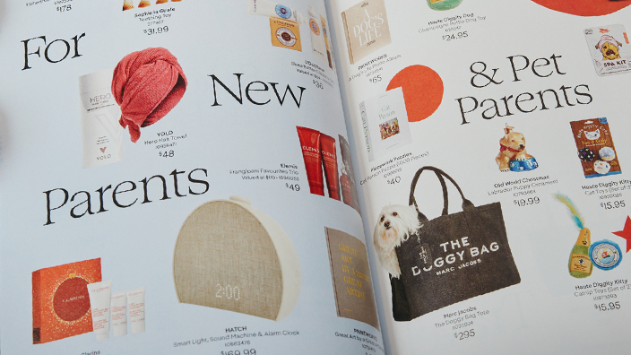 A stack of catalogs fanned out on a table