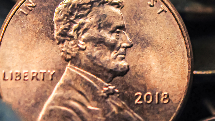 A close-up of a penny