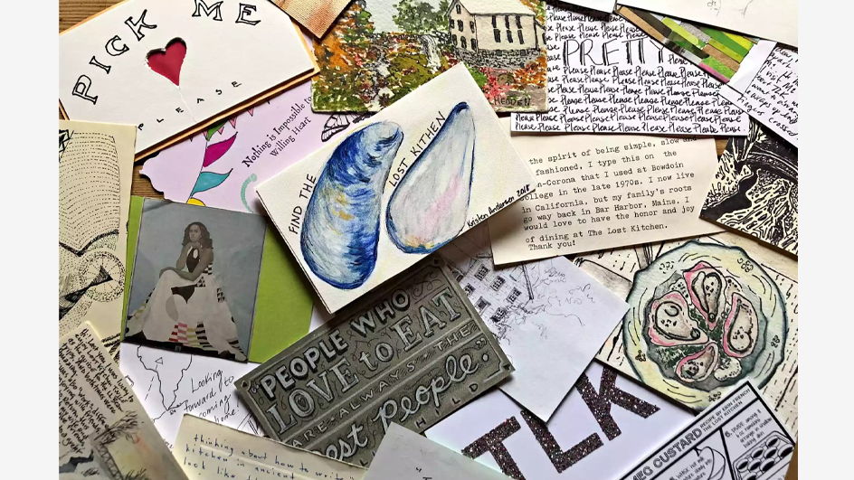 A collection of postcards fanned out on a tabletop