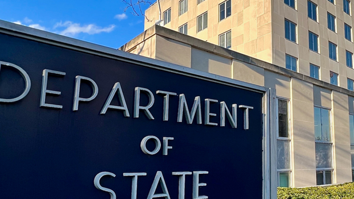 Sign reading “Department of State” outside of the department’s headquarters building in Washington, DC