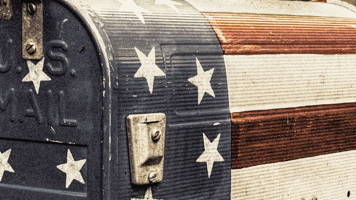 A mailbox painted to resemble the American flag