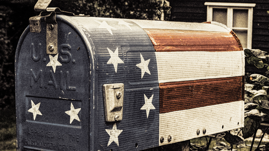 A mailbox painted to resemble the American flag