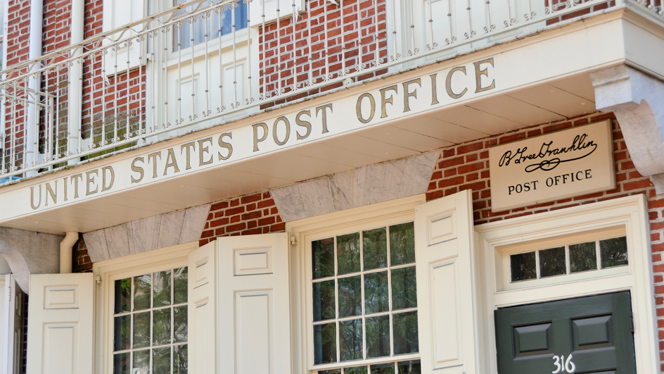 A brick building displaying “B. Free Franklin Post Office”