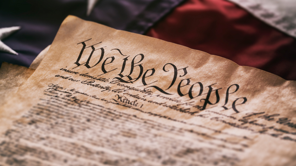 The Declaration of Independence resting on an American flag