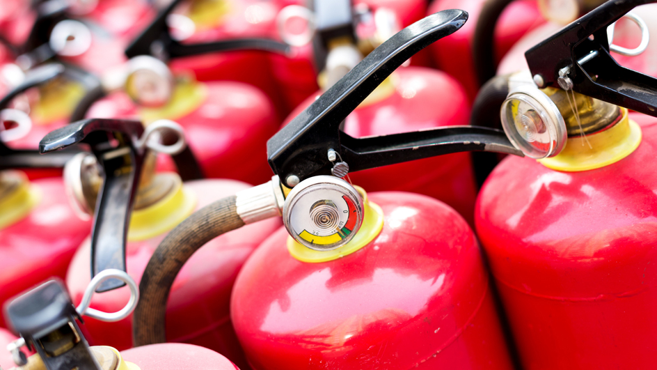 Group of red fire extinguishers