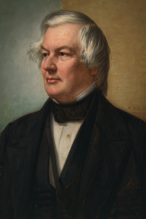 Left-facing color portrait of President Millard Fillmore wearing a dark suit and white shirt