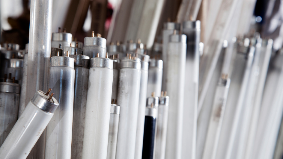 A group of used fluorescent light bulbs