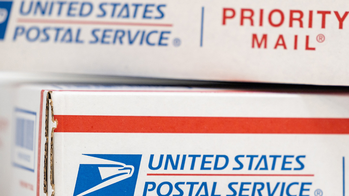 A stack of Priority Mail boxes